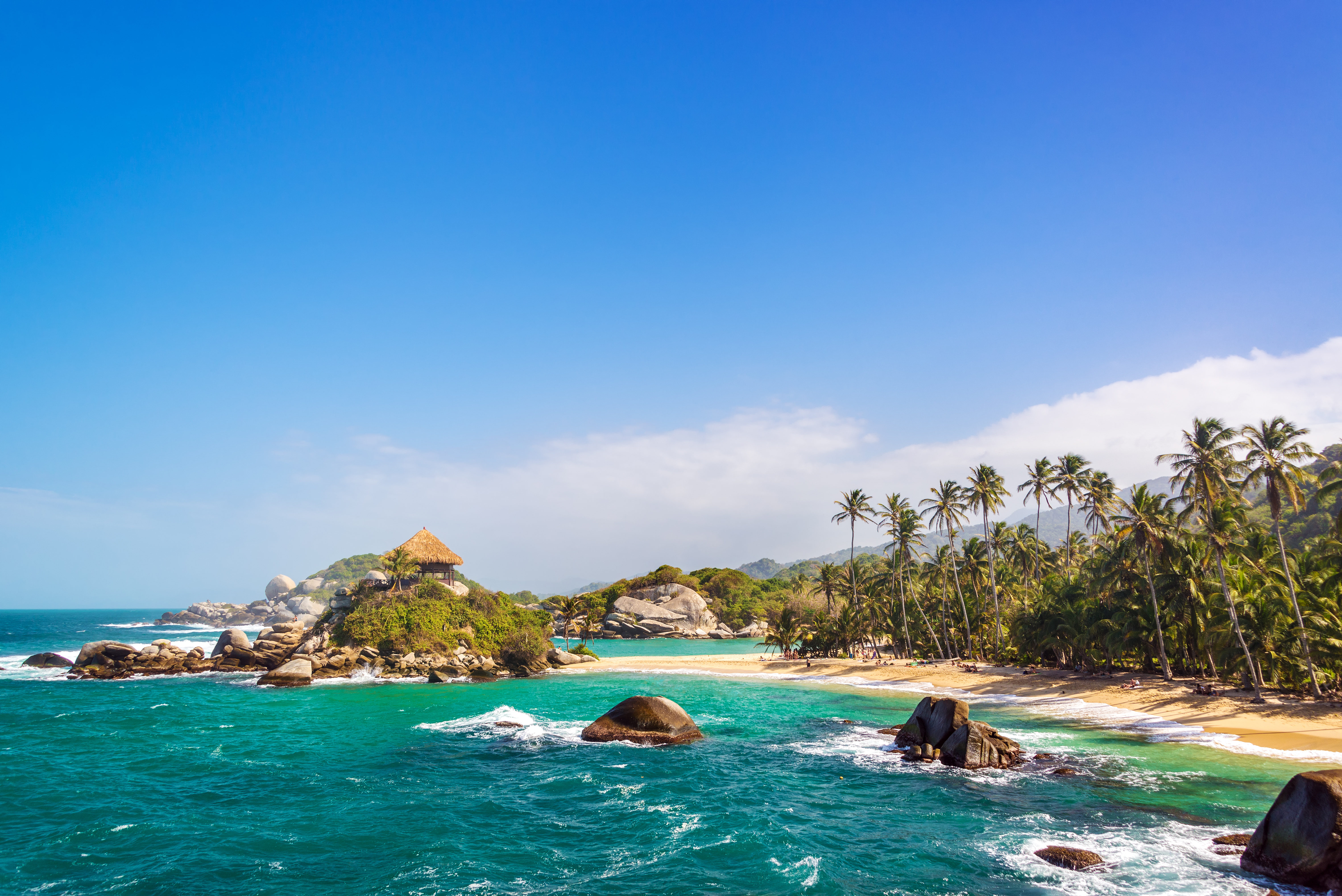 One of Tayrona's beaces with a hut on a hill nearby