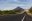 NIC_Managua_shutterstock_452165521 Tarmac road heading towards tall mountain