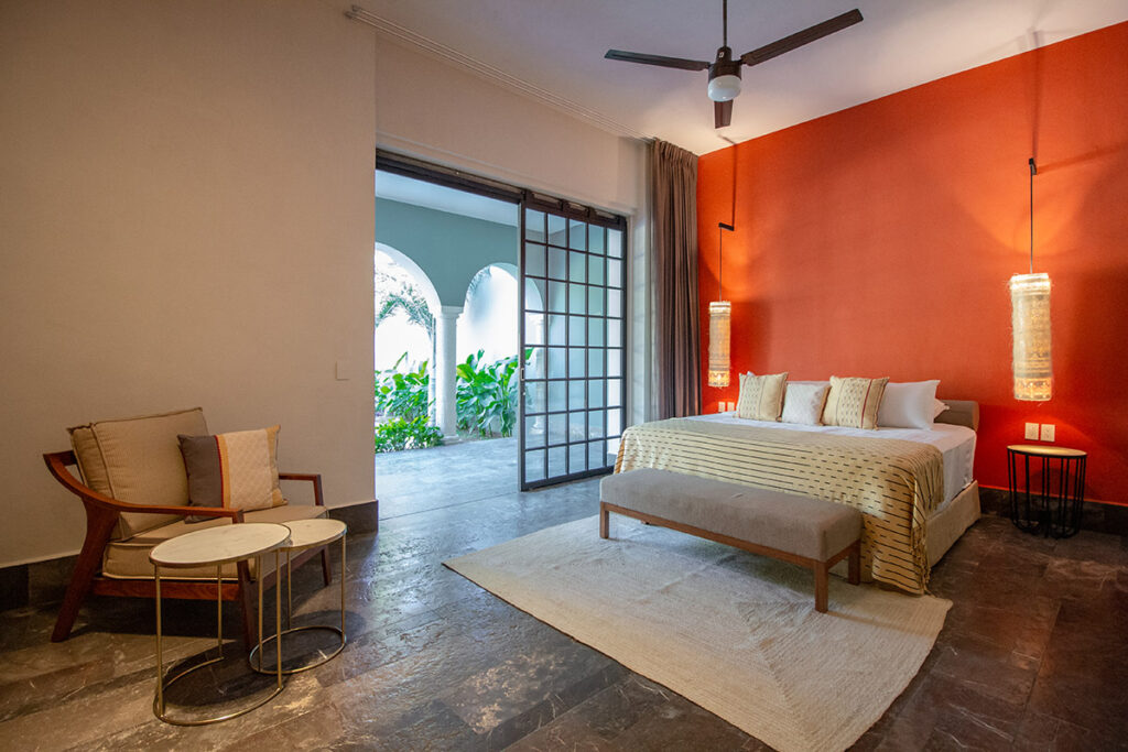 Junior guest room with sliding doors and terrace