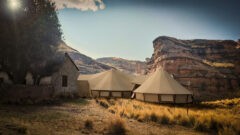 Exterior of tent with view of mountains in the background