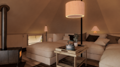 Lounge area with sofas inside a tent