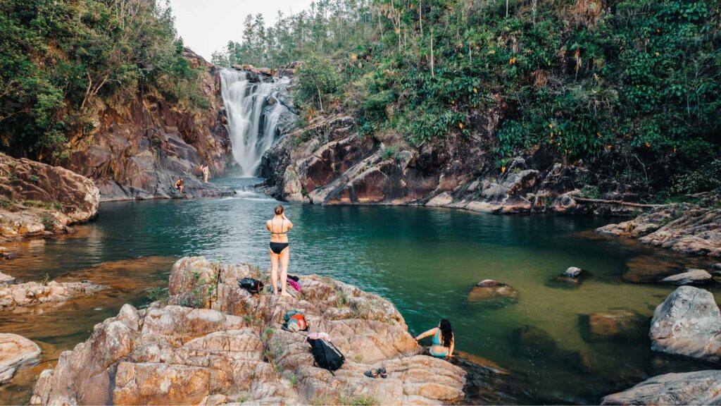 Waterfall and natural pool in a tropical forest setting