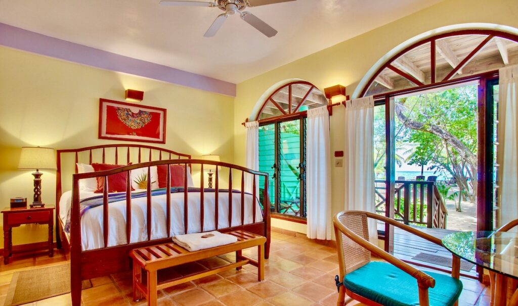 King size bed at Hamanasi Adventure & Dive Resort