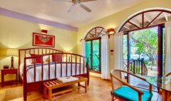 King size bed at Hamanasi Adventure & Dive Resort
