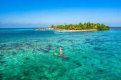 Paddleboarding on Ray Caye Island Resort