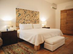 Bedroom in Puebla's Casareyna Hotel in Mexico
