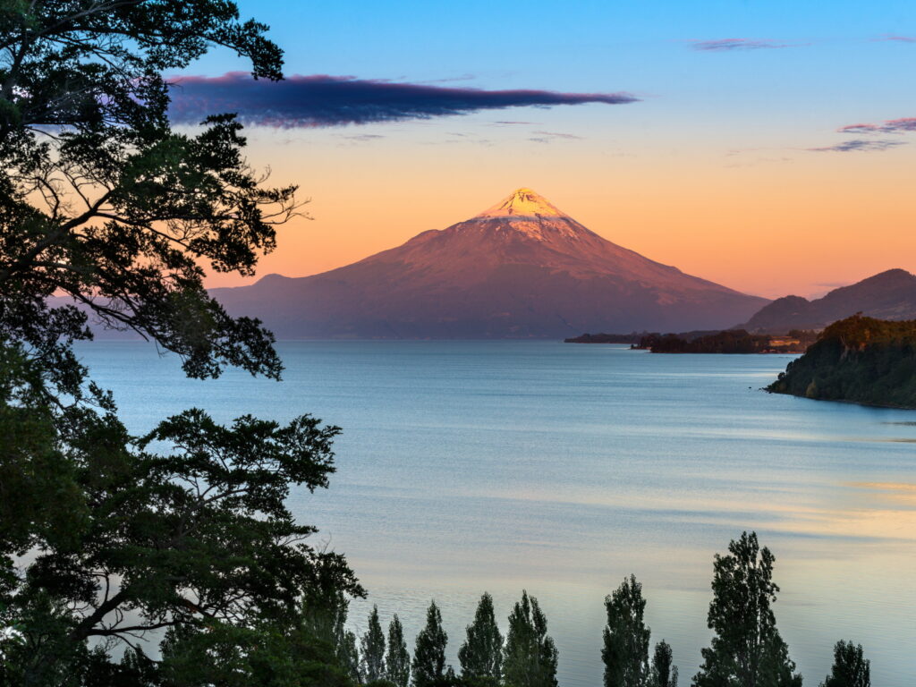 Sun setting over Osorno Lake
