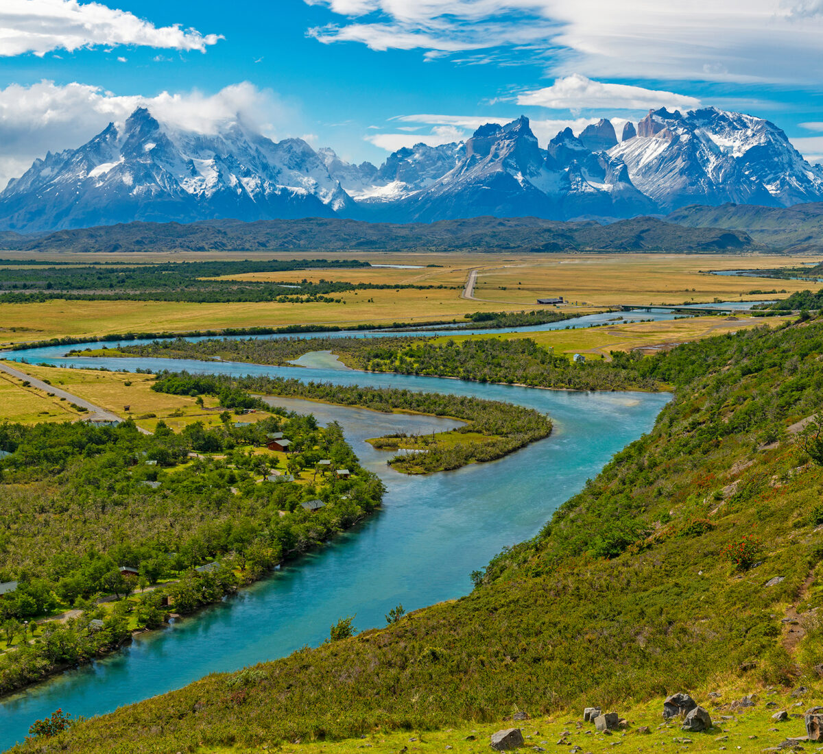 River meandering towards mountains in Torres Del Paine