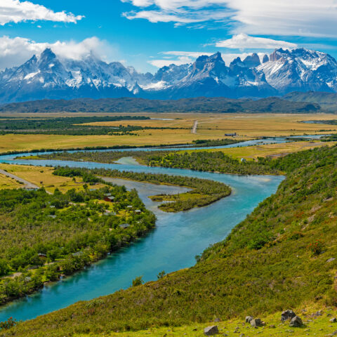 River meandering towards mountains in Torres Del Paine