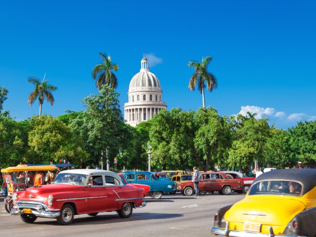 Colourful cars driving in Havana, Cuba
