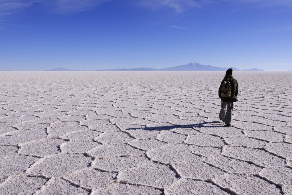Walking on Salt Flats of Uyuni in Bolivia