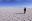 Walking on Salt Flats of Uyuni in Bolivia Walking on Salt Flats of Uyuni in Bolivia