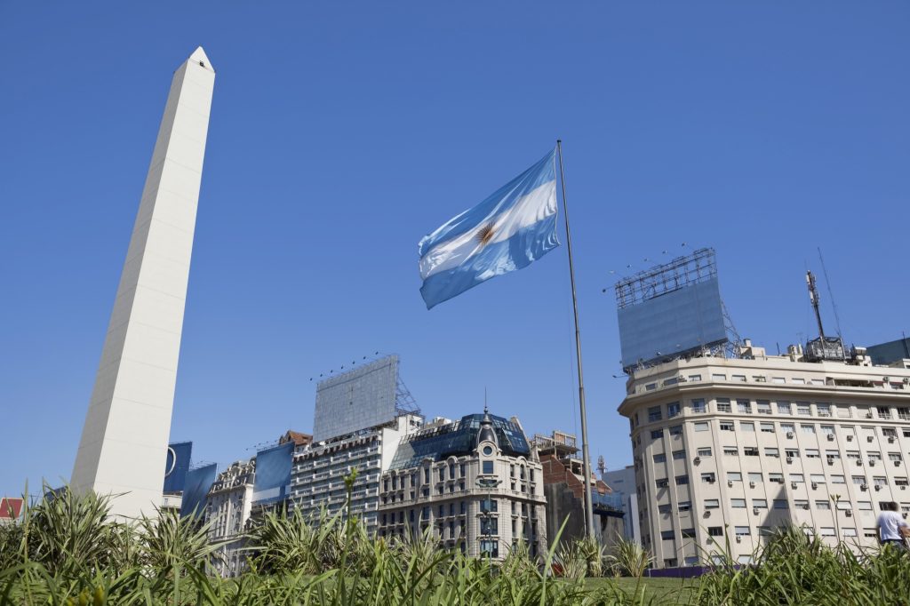 Argentina Buenos Aires obelisco with argentine flag