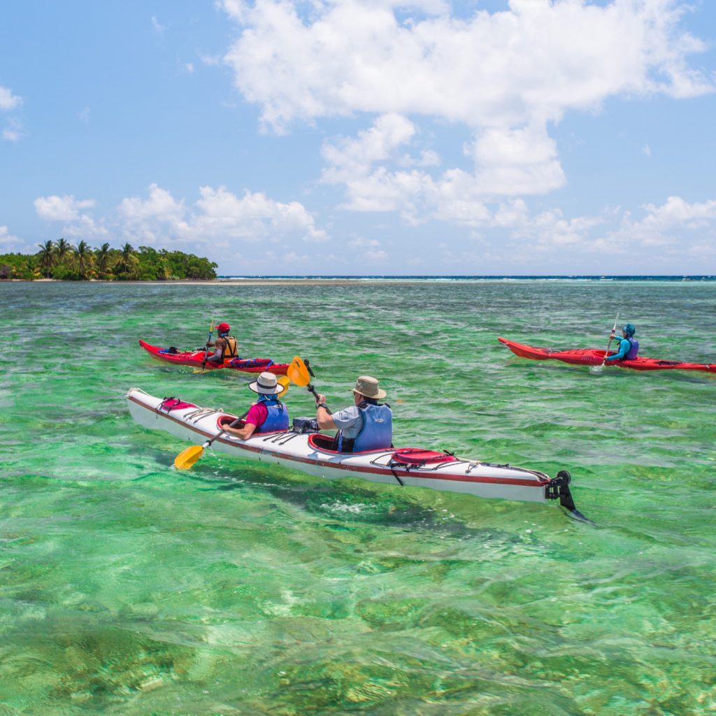 Kayaking through Glovers Reef