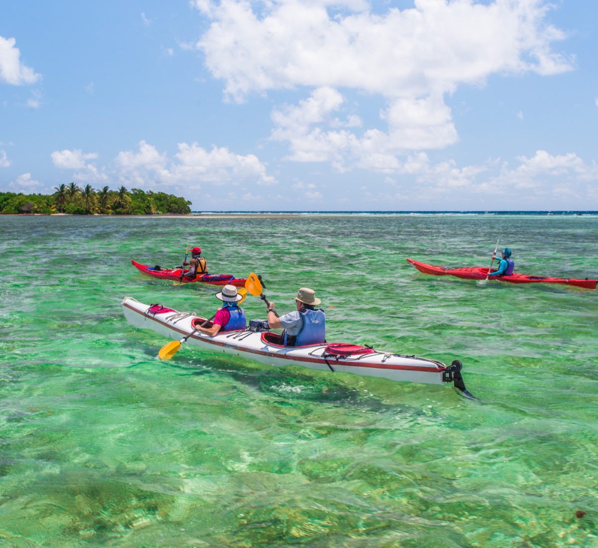 Kayaking through Glovers Reef