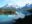 iStock © Blue skies over mountains in Torres Del Paine.