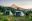 TREK GUATEMALA © Tents set up on a grassy hill on a trek