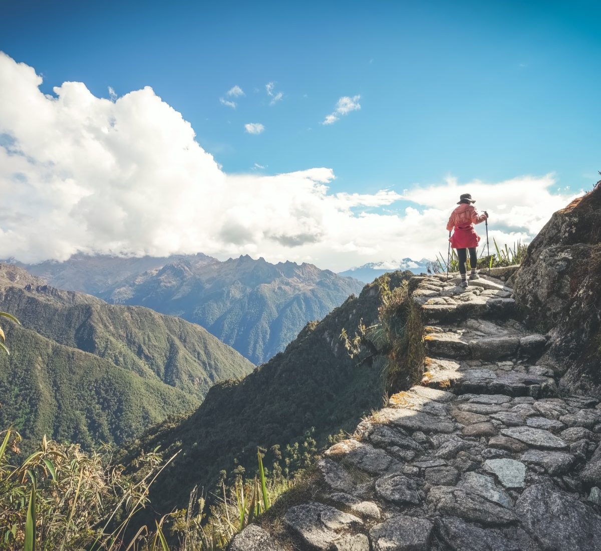 Hiker walking up the trail to Machu Picchu