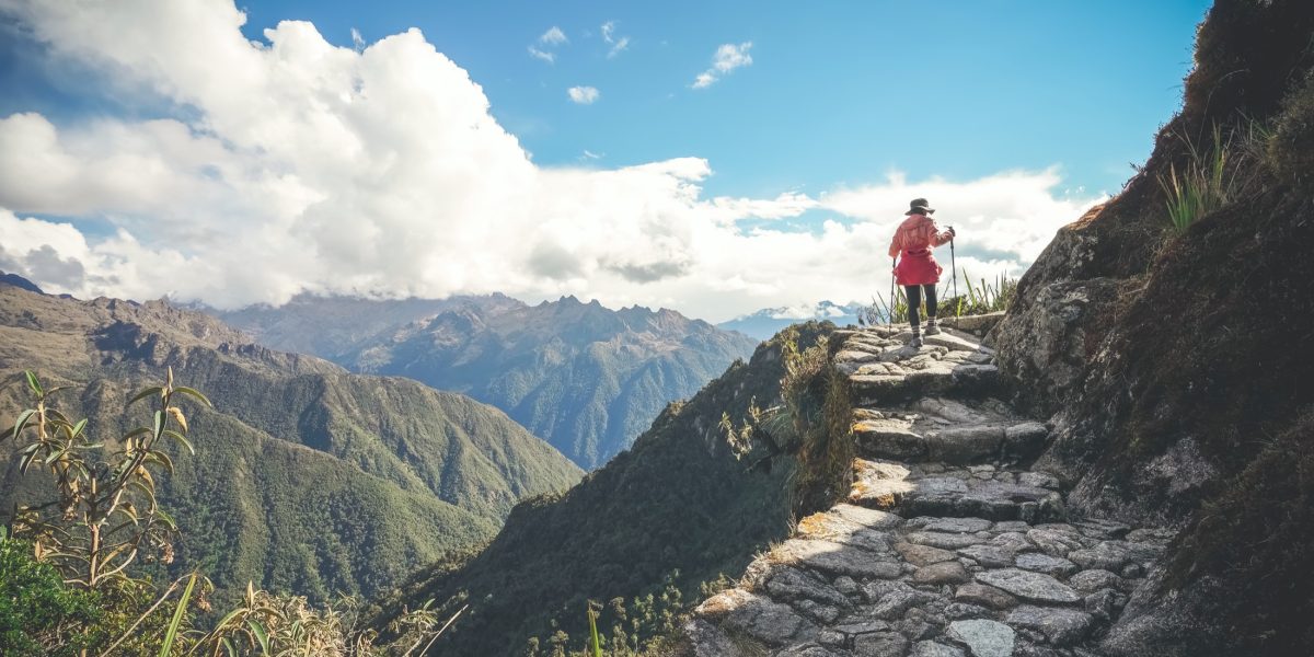 Hiker walking up the trail to Machu Picchu