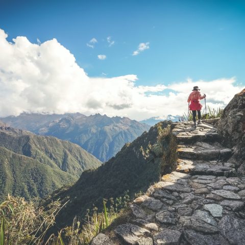 Hiker walking up the trail to Machu Picchu