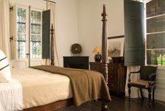 Guest room with king bed in Estancia La Bamba
