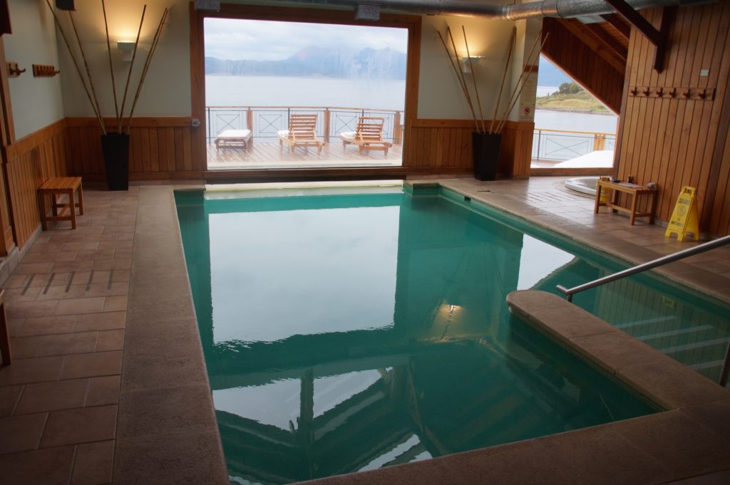 Indoor pool with ocean view at Los Cauqenes Resort and Spa