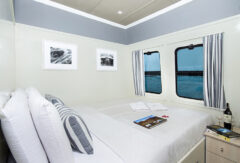 Cabin with double bed and ocean view