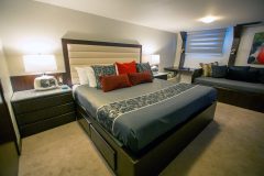 Guest room with a double bed on the Passion ship
