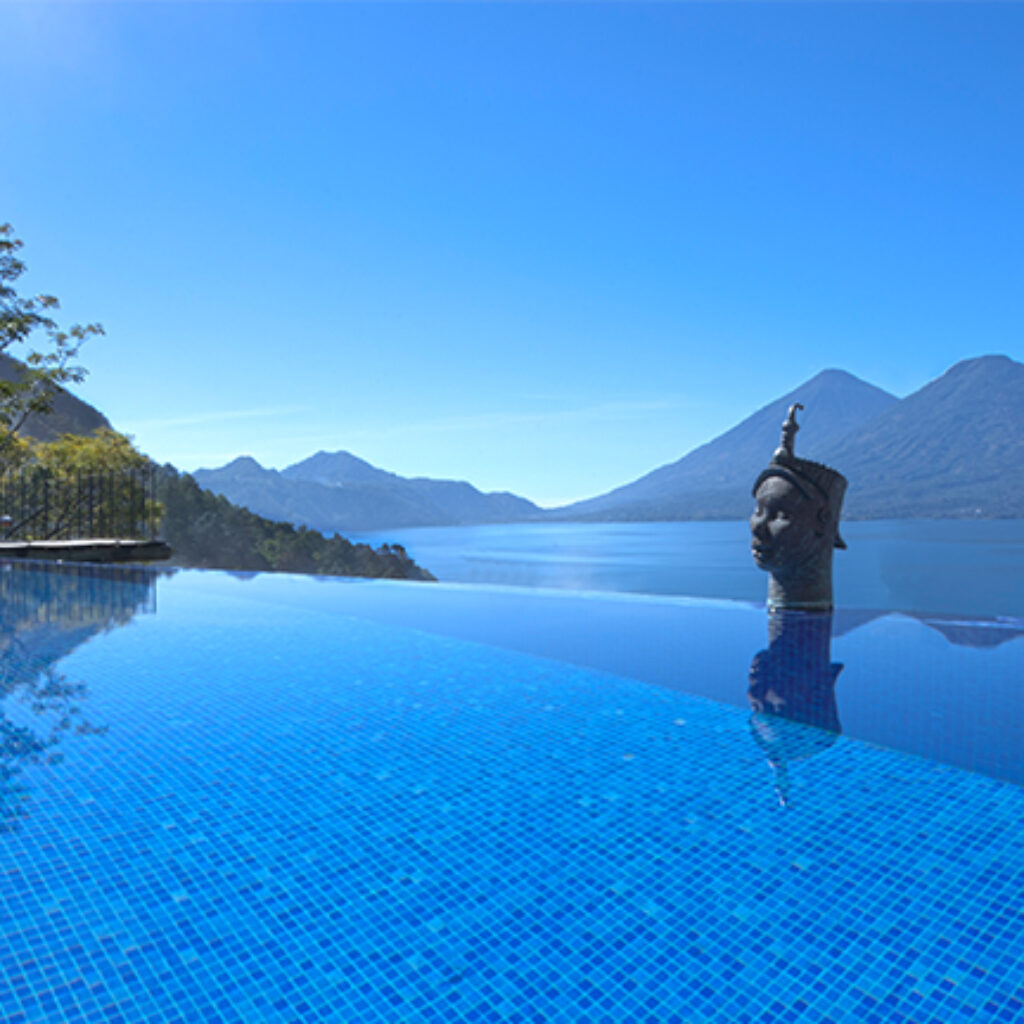 Infinity swimming pool with mountain backdrop