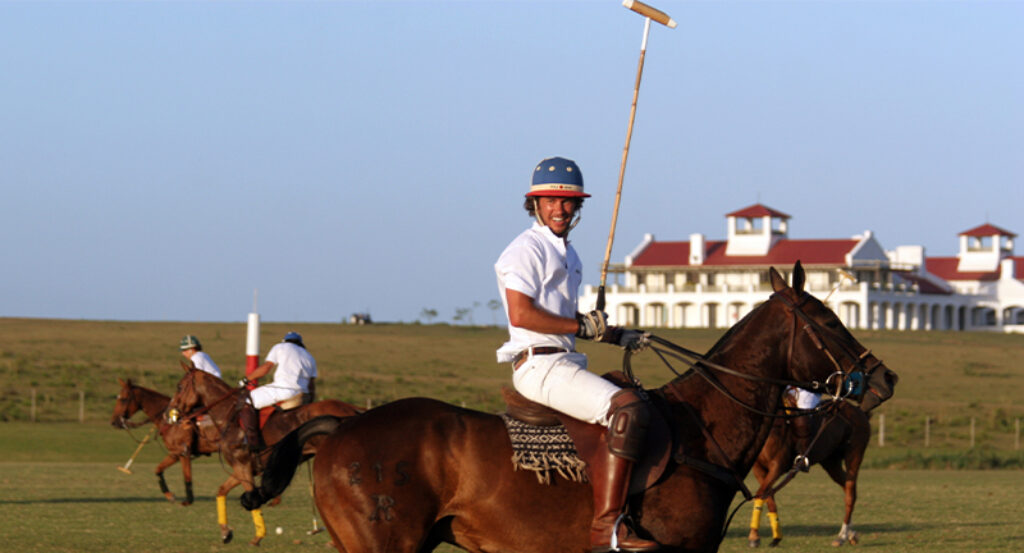Polo player riding horse