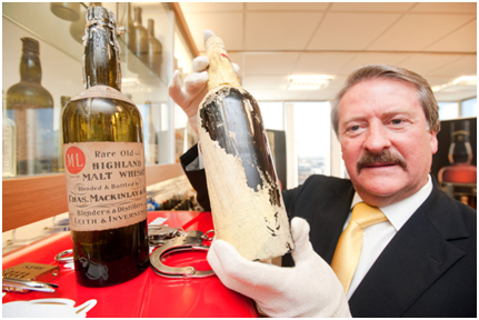 Richard Paterson with one of Shackletons original bottles