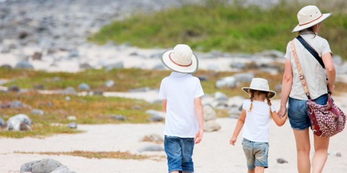 Children walking on the beach