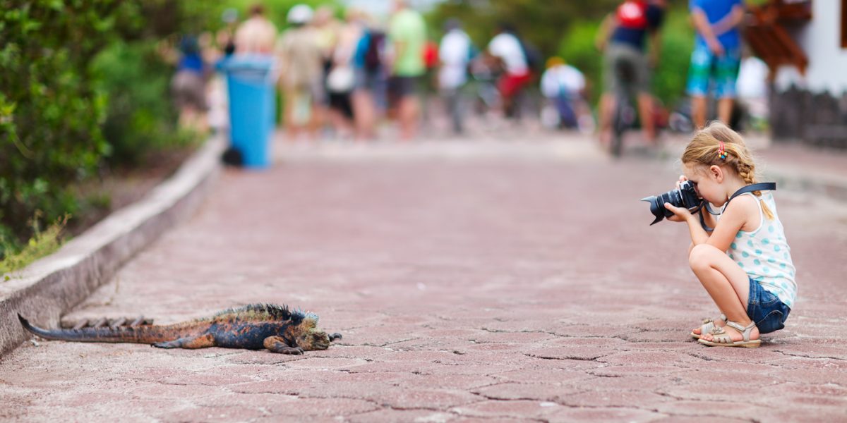 GPS_GirlphotographingIguana_shutterstock126538988_freewithcredit