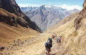 A group trekking mountains in Peru