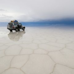 jeep in the salt lake salar de uyuni, bolivia jeep in the salt lake salar de uyuni, bolivia
